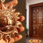 Main Door Vastu Tips: हर कोई क्यों लगा रहा है मुख्य द्वार पर तांबे का सूर्य? वजह चौंका देगी